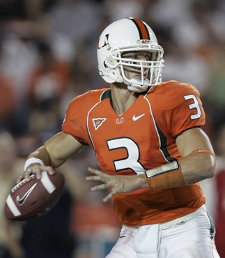 Miami quarterback Kyle Wright prepares to pass during the first quarter of a football game against Florida International at the Orange Bowl in Miami,...