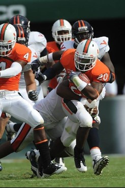 University of Miami Hurricanes running back Damien Berry #20 carries the ball against the Virginia Cavaliers at Land Shark Stadium on November 7,...