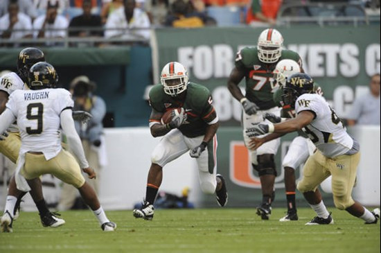 University of Miami Hurricanes running back Javarris James #5 carries the ball against the Deamon Deacons of Wake Forest at Dolphin Stadium on October...