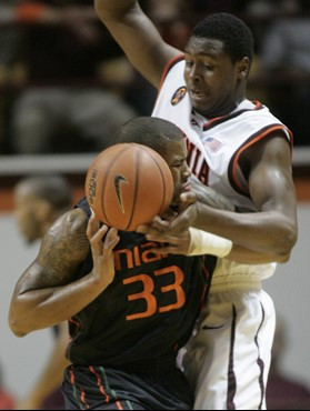 Jack McClinton collides with Virginia Tech's Jeff Allen. (AP Photo/The Roanoke Times, Justin Cook)