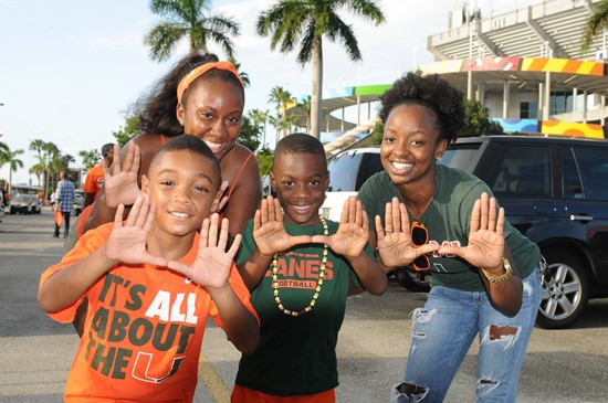 University of Miami Hurricane fans show their team spirit in a game against the Savannah State Tigers at Sun Life Stadium on September 21, 2013. ...