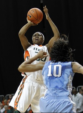 Sylvia Bullock shoots over North Carolina's Danielle Butts. (AP Photo/Alan Diaz)