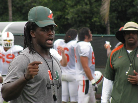 Linebacker Sean Spence coaches his teammates during the first session of practice on day six.