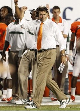 Miami head coach Al Golden pumps his fist during the second quarter of an NCAA college football game against Ohio State in Miami, Saturday, Sept. 17,...