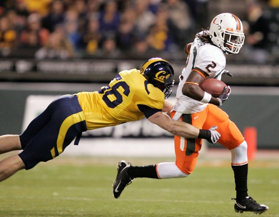 Graig Cooper is tackled by California linebacker Zack Follett in the first half of the Emerald Bowl in San Francisco, Saturday, Dec. 27, 2008. (AP...