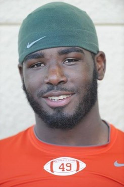 University of Miami Hurricanes defensive lineman Dyron Dye #49 cools down after practice at Greentree Practice Field on August 13 in afternoon drills...