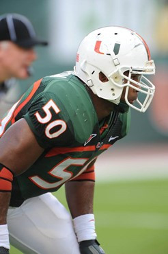 University of Miami Hurricanes linebacker Darryl Sharpton #50 plays in a game against the Deamon Deacons of Wake Forest at Dolphin Stadium on October...