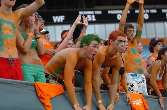 University of Miami Hurricane fans show their team spirit in a game against the Deamon Deacons of Wake Forest at Dolphin Stadium on October 25, 2008. ...