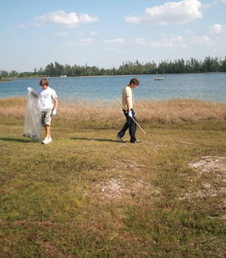 UM Staff, Coaches & Student Athletes volunteer at Amelia Earhart Park Community Service Project.