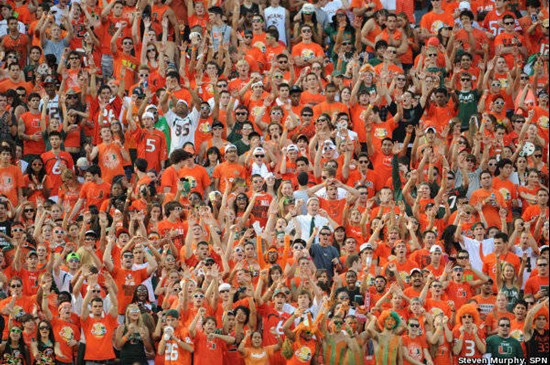 A University of Miami Hurricanes fan shows his team spirit in a game against the Georgia Tech Yellow Jackets at Sun Life Stadium on October 22, 2011. ...