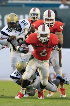 Miami running back Lamar Miller (6) runs for yardage during second half against Georgia Tech. Miller ran for 93 yards and scored as Miami defeated No....