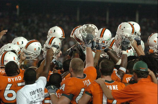 University of Miami Hurricanes unite with helmets raised after a midfield bench clearing brawl between the University of Miami Hurricanes and the...
