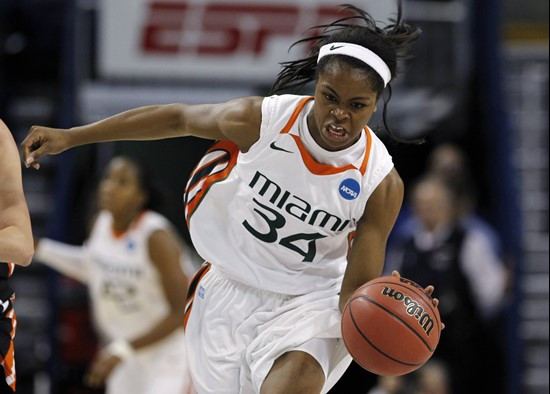 Miami's Sylvia Bullock drives the ball up court against Idaho State in the second half of an NCAA tournament first-round women's college basketball...