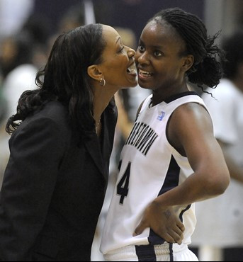 Georgetown coach Terri Williams talks with Sugar Rodgers during second half of an NCAA college basketball game against Miami, Wednesday, Dec. 21,...
