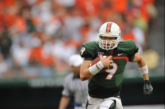 University of Miami Hurricanes quarterback Robert Marve #9 rushed for 43 yards to set up a first and goal from the three yard line leading to a Canes...