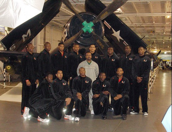 The Hurricanes get a team photo taken aboard the USS Yorktown at the Charleston Classic welcome reception.