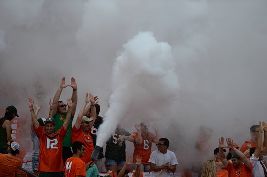 A University of Miami Hurricanes fan shows his team spirit in a game against the Arkansas State Red Wolves at Sun Life Stadium on September13, 2014. ...