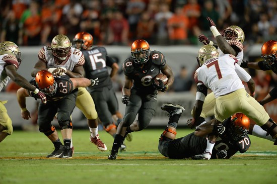 University of Miami Hurricanes running back Duke Johnson #8 plays in a game against the Florida State Seminoles at Sun Life Stadium on November 15,...
