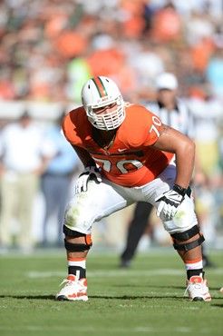 University of Miami Hurricanes offensive lineman Jonathan Feliciano #70 plays in a game against the Georgia Tech Yellow Jackets at Sun Life Stadium on...