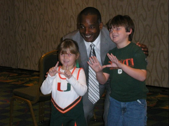 Randy Shannon posing for photos with fans prior to Monday's Champs Sports Bowl Kickoff Luncheon at the Marriott World Center Resort.