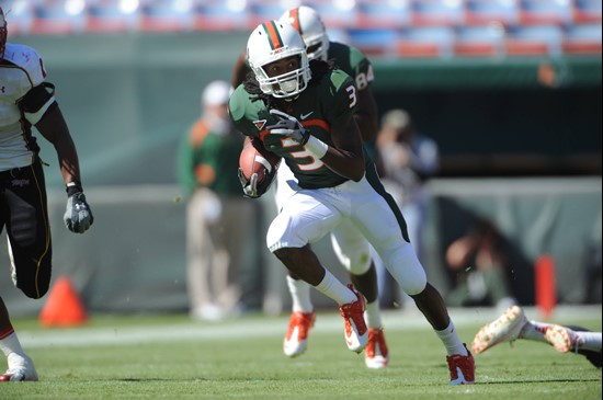 University of Miami Hurricanes wide receiver Travis Benjamin #3 catches a pass in a game against the Maryland Terrapins at Sun Life Stadium on...