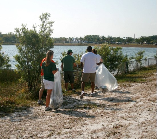UM Staff, Coaches & Student Athletes volunteer at Amelia Earhart Park Community Service Project.