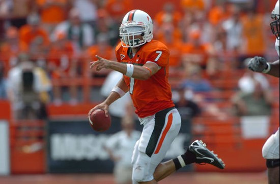 University of Miami quarterback Kirby Freeman #7 roles out to his right looking for an open receiver during a game against Marshall. Freeman...