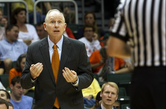 Miami's coach Jim Larranaga appeals a foul call by an official during the first half of an NCAA college basketball game against Florida State in Coral...