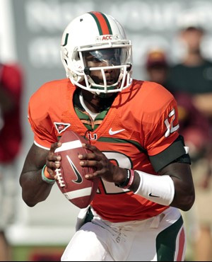 Miami quarterback Jacory Harris prepares to pass against Bethune-Cookman in the first half of an NCAA college football game in Miami, on Saturday,...