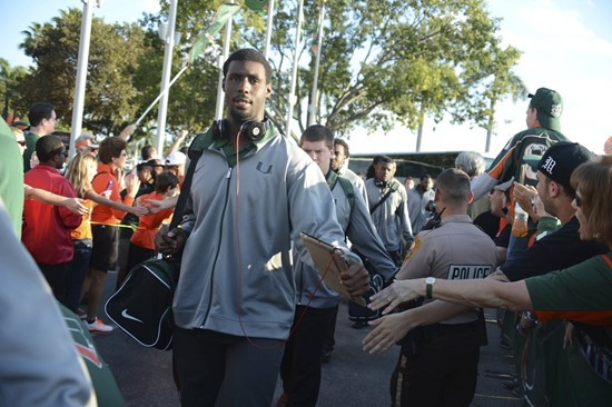 University of Miami Hurricane Fans greet the team as they arrive at SunLife Stadium before a game against the Virginia Tech Hokies at Sun Life Stadium...