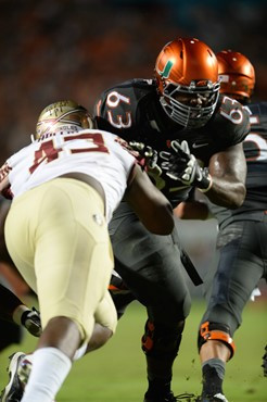University of Miami Hurricanes offensive lineman Danny Isidora #63 plays in a game against the Florida State Seminoles at Sun Life Stadium on November...