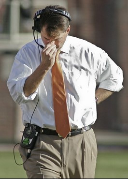 Miami head coach Al Golden paces the sidelines during the first quarter of an NCAA college football game against Florida State on Saturday, Nov. 12,...