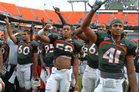 University of Miami Hurricane players salute fans at the end of the game as they sing the Alma Mater. The Hurricanes beat the Deamon Deacons of Wake...