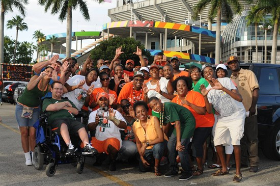 University of Miami Hurricane fans show their team spirit in a game against the Savannah State Tigers at Sun Life Stadium on September 21, 2013. ...