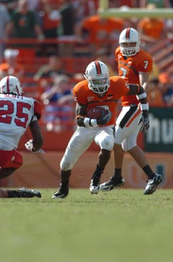 University of Miami running back Graig Cooper #2 rushes in a game against the North Carolina State Wolfpack at the Orange Bowl on November 3, 2007. ...