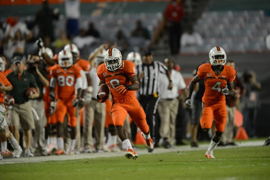 University of Miami Hurricanes running back Duke Johnson #8 plays in a game against the Virginia Tech Hokies at Sun Life Stadium on November 1, 2012. ...