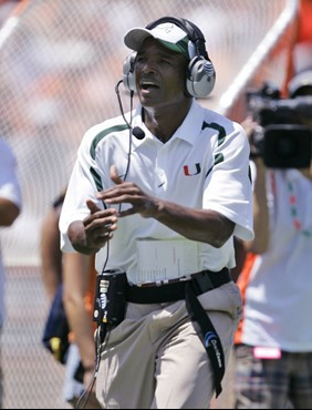 Miami head coach Randy Shannon calls out to an official from the sideline during the second quarter of a football game against Marshall, Saturday,...