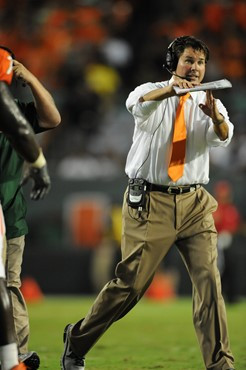 University of Miami Hurricanes head coach Al Golden calls in a play in a game against the Ohio State Buckeyes at Sun Life Stadium on September 17,...