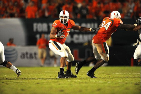 University of Miami Hurricanes offensive lineman Tyrone Byrd #67 gets set to block in a game against Charleston Southern University in the Canes...