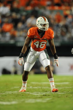 University of Miami Hurricanes defensive lineman Andrew Smith #48 plays in a game against the Ohio State Buckeyes at Sun Life Stadium on September 17,...