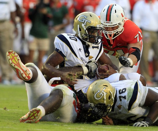 Georgia Tech quarterback Synjyn Days (10) is sacked during second half of an NCAA college football game against Miami,. (AP Photo/Wilfredo Lee)