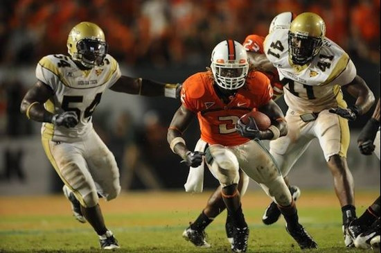 University of Miami Hurricanes running back Graig Cooper #2 rushes in a game against the Georgia Tech Yellow Jackets at Land Shark Stadium on...