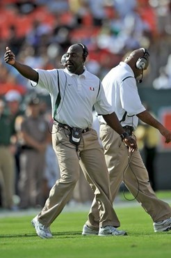 University of Miami Hurricanes defensive line coach Clint Hurtt discusses a call with his players in a game against the Clemson Tigers at Land Shark...