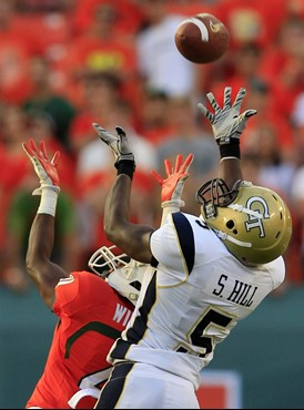 Georgia Tech wide receiver Stephen Hill (5) is unable to pull in a pass as he is guarded by Miami defensive back Mike Williams. (AP Photo/Wilfredo...