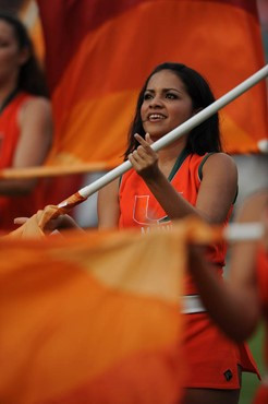 A University of Miami Band of the Hour participant entertains the crowd in a game against the University of Central Florida Knights at Dolphin Stadium...