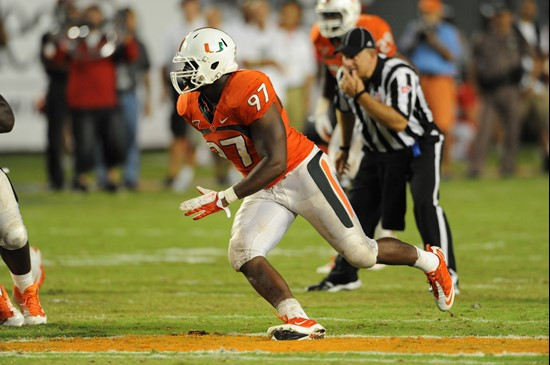 University of Miami Hurricanes defensive lineman Adewale Ojomo #97 plays in a game against the Ohio State Buckeyes at Sun Life Stadium on September...