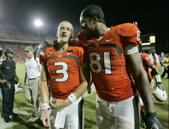 Miami quarterback Kyle Wright (3) walks off the field with defensive end Calais Campbell (81) after Miami defeated Texas A&M, 34-17 Thursday. (AP...