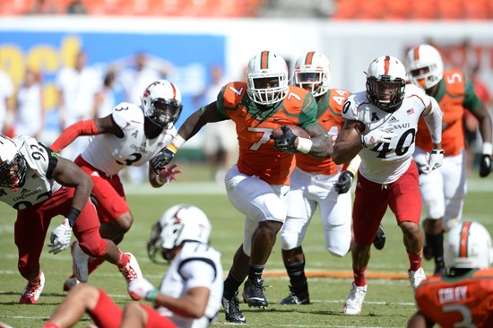 University of Miami Hurricanes running back Duke Johnson #8 plays in a game against the Cincinnati Bearcats at Sun Life Stadium on October 11, 2014.  ...