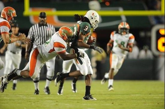 University of Miami Hurricanes wide receiver Travis Benjamin #3 catches a pass in a game against the Florida A&M Rattlers at Land Shark Stadium on...