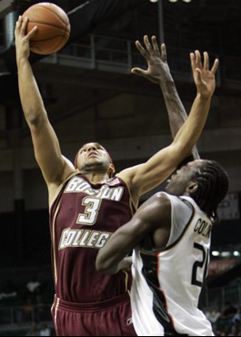 Boston College's Jared Dudley (3) is fouled by Miami's Dwayne Collins, right, in the second half of a basketball game in Coral Gables, Fla.,...